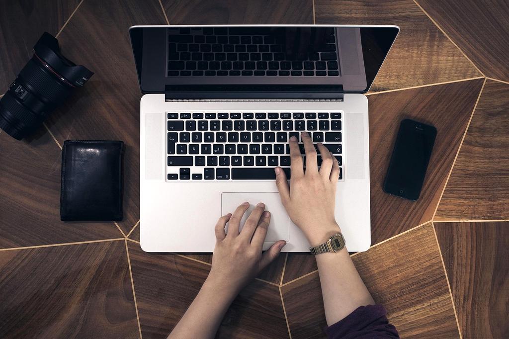User interacting with holographic workspace